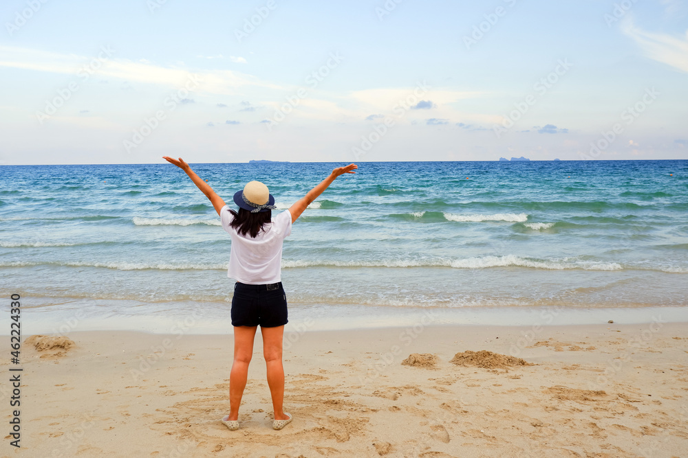 Young asia woman sitting resting on tropical Beach Young asia woman sitting resting on tropical Beach