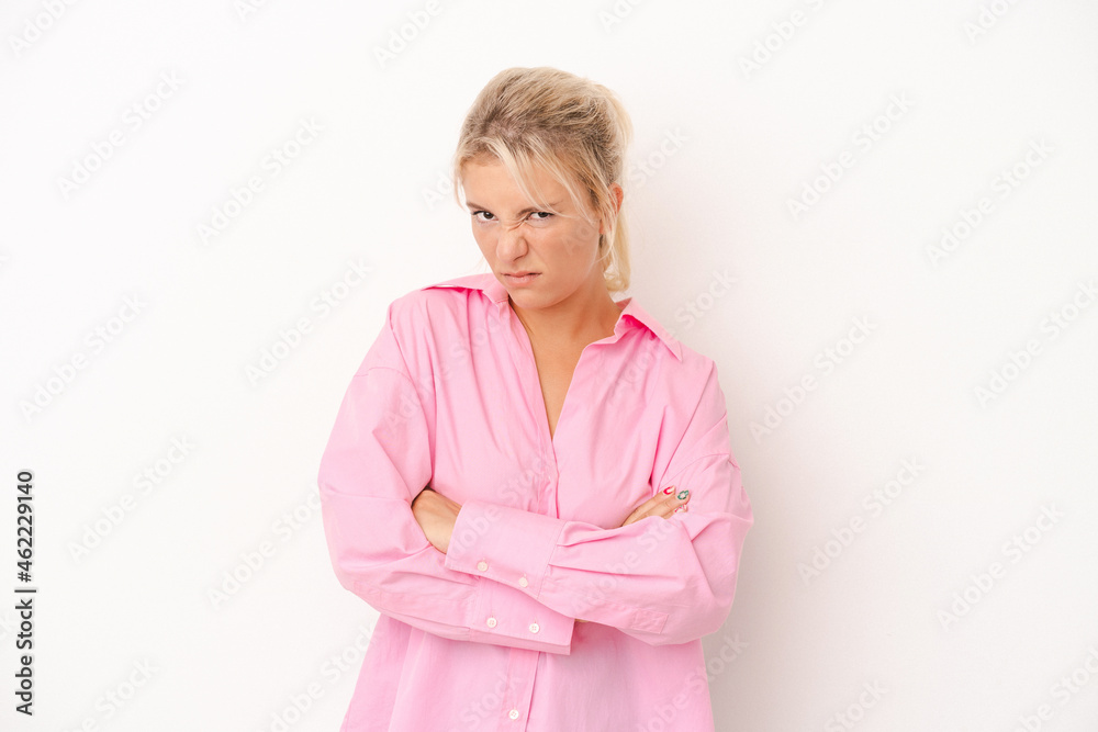 Young Russian woman isolated on white background unhappy looking in camera with sarcastic expression. Young Russian woman isolated on white background unhappy looking in camera with sarcastic expression.