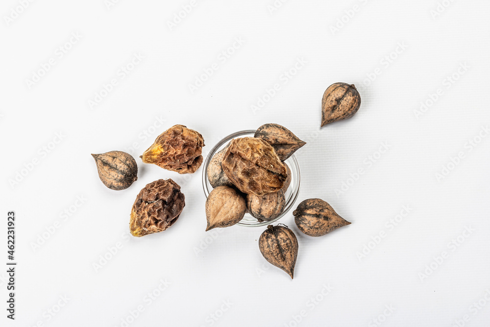 Ripe Juglans cordiformis Maxim or heart-shaped walnut isolated on white background Ripe Juglans cordiformis Maxim or heart-shaped walnut isolated on white background