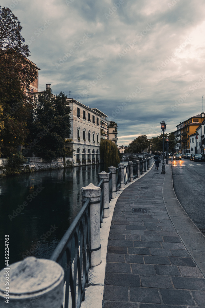 the river in the city centre of Treviso in Italy in the evening