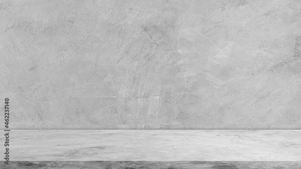 Empty gray cement wall room and floor interiors studio background, well editing montage display products and text present on free space concrete backdrop Empty gray cement wall room and floor interiors studio background, well editing montage display products and text present on free space concrete backdrop