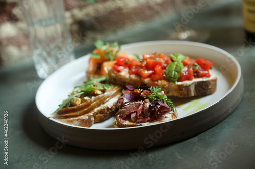 Assorted bruschetta on a plate