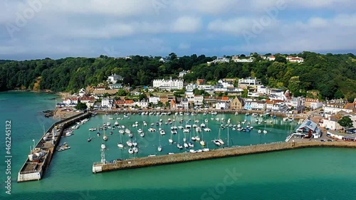 Aerial video of St Aubin's Harbour at high tide with St Aubin's village in the background, Jersey, Channel Islands photo