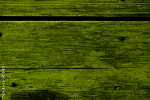 Dark green wooden old rough plank, dark woody background, grunge texture.