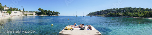 ra wide view of the beautiful Fosses Beach in Saint Jean Cap Ferrat with tropical colored water photo