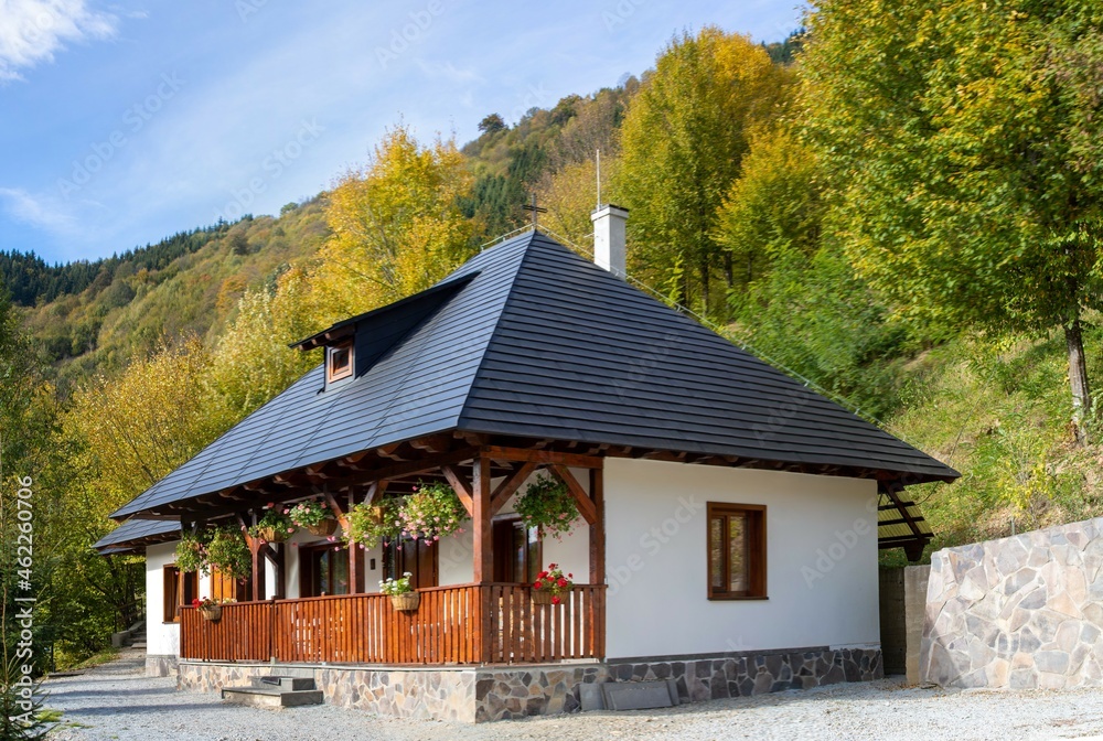 a traditional house with a porch