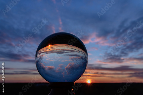 Fototapeta Naklejka Na Ścianę i Meble -  Beautiful sunset reflected in a crystal ball