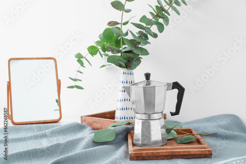 Moka pot coffee maker on wo...