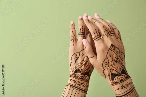 Female hands with henna tat...