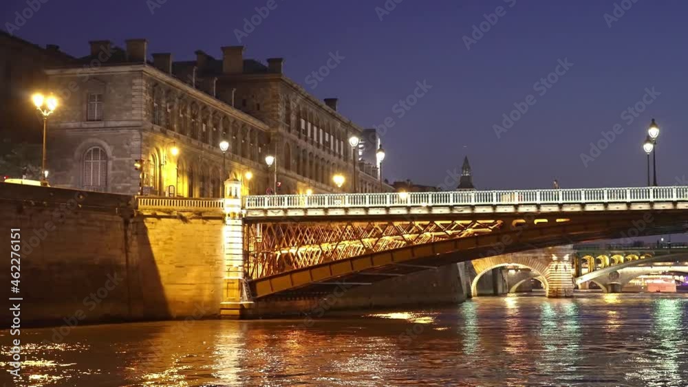 Paris at night. Bridges over Seine river. Tourism attraction, famous landmark. Romantic honeymoon travel destination Paris at night. Bridges over Seine river. Tourism attraction, famous landmark. Romantic honeymoon travel destination