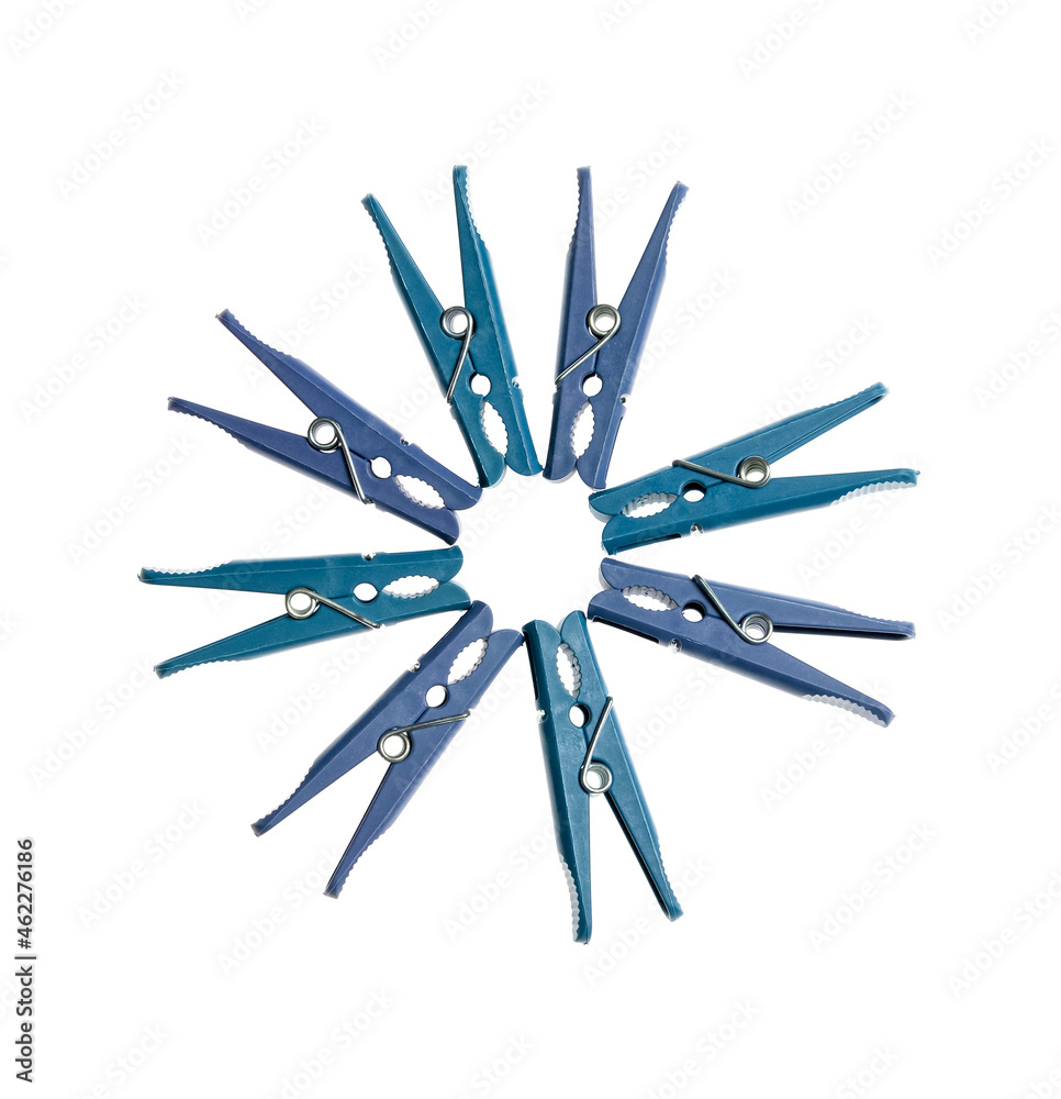 Frame made of plastic clothespins on white background Frame made of plastic clothespins on white background