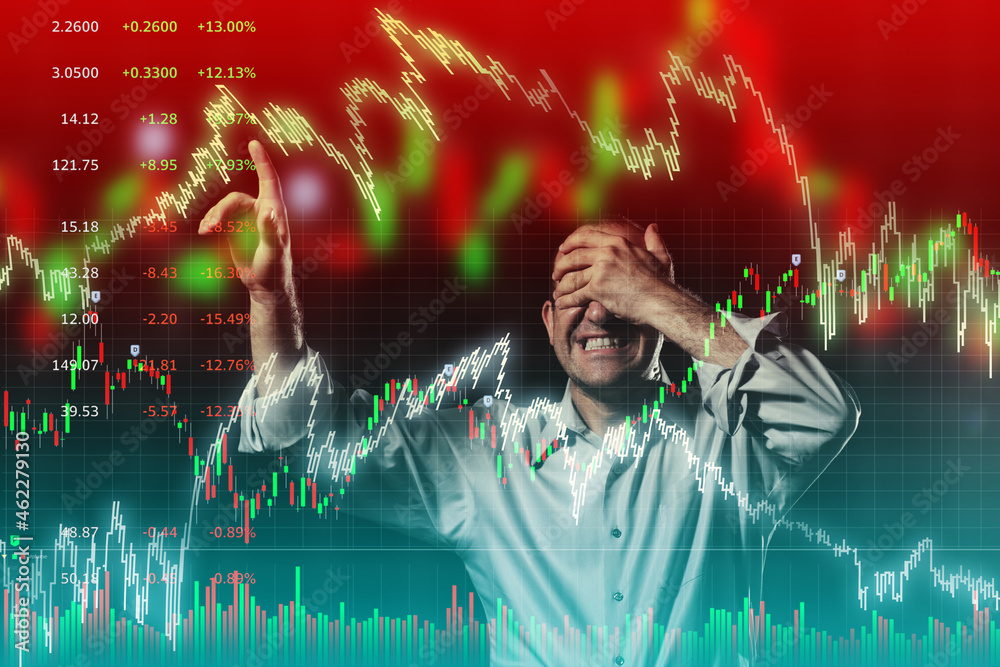 Scared trader pointing to volatile stock market charts with eyes closed. - obrazy, fototapety, plakaty 
