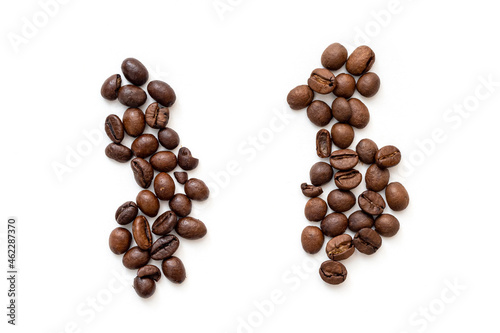 Photos Two heaps of coffee grain Robusta and Arabica