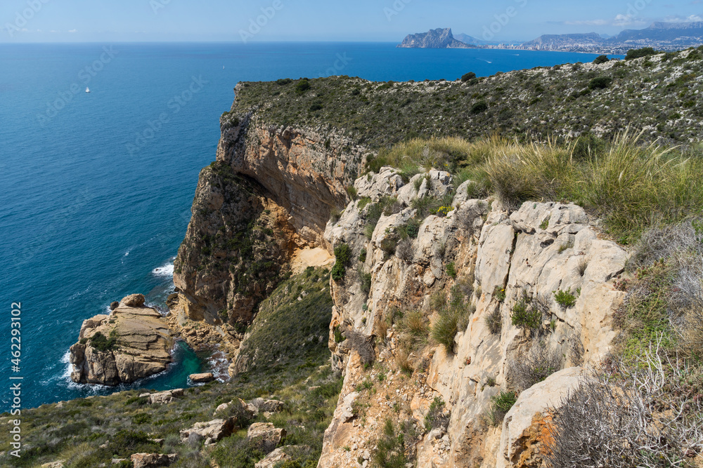 blue Mediterranean sea and limestone cliffs beautiful seascape in Spain Cap d´Or in Moraira