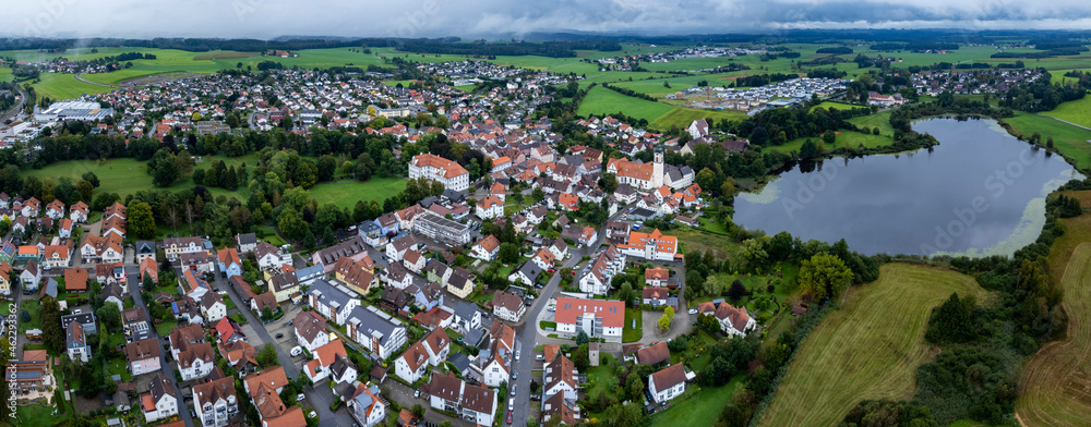 Aerial of the city Kißlegg in Germany on a cloudy day in summer