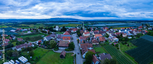 Aerial view of the village Ittendorf in Germany on a cloudy day in summer