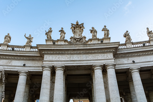 Detail of the columns and statues in the colonnade of the St Peters Square of The Vatican © Lukas