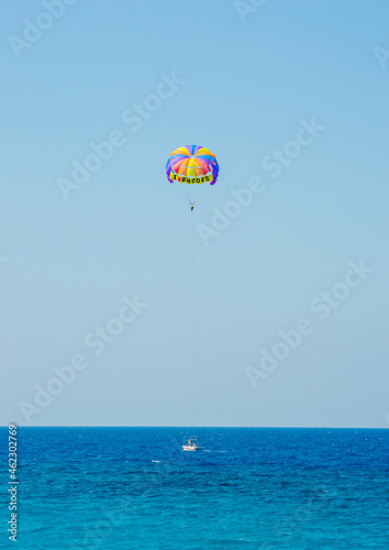 Two person enjoying the Parasailing at Akti Kanari Beach Greece