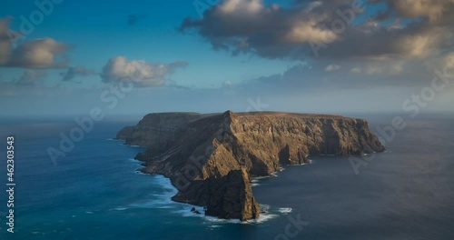 Ilheu da Cal, a small island next to Porto Santo, as seen from Ponta da Calheta viewpoint. Madeira, Portugal. Time-lapse
