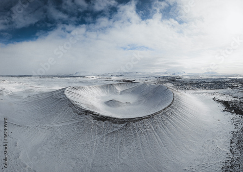 Aerial drone panorama snowy winter landscape view of huge volcano cone crater Hverfjall near Myvatn Reykjahlid Northern Iceland Europe