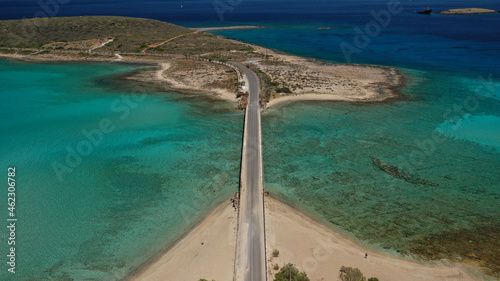 Aerial drone photo of main port of Kythera island and turquoise exotic beach of Diakofti, Ionian, Greece photo