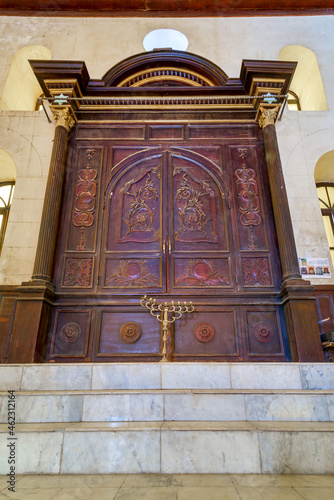 Wooden decorated entrance of historic Jewish Maimonides Synagogue or Rav Moshe Synagogue with arched windows and chandelier in Gamalia district, Cairo Egypt photo