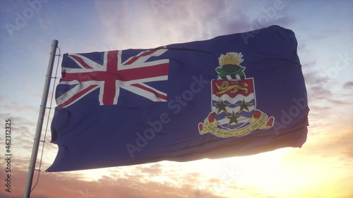 Flag of Cayman Islands waving in the wind, sky and sun background. 3d rendering photo