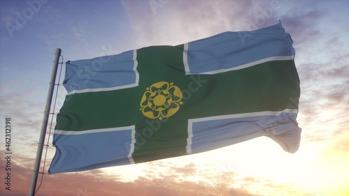 Derbyshire flag, England, waving in the wind, sky and sun background. 3d rendering photo