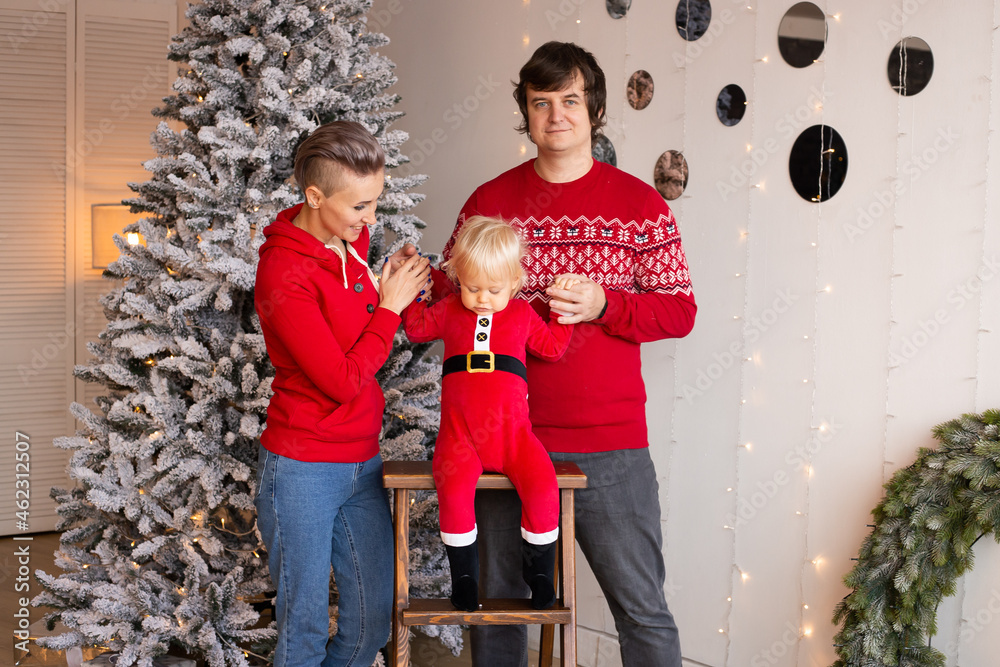 Family at home on Christmas. Merry Christmas and Happy New Year Family at home on Christmas. Merry Christmas and Happy New Year