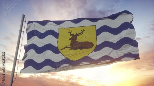 Hertfordshire flag, England, waving in the wind, sky and sun background. 3d rendering photo