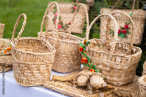 Wicker furniture items. Baskets and boxes for a picnic  linen and various things at a folk craft fair