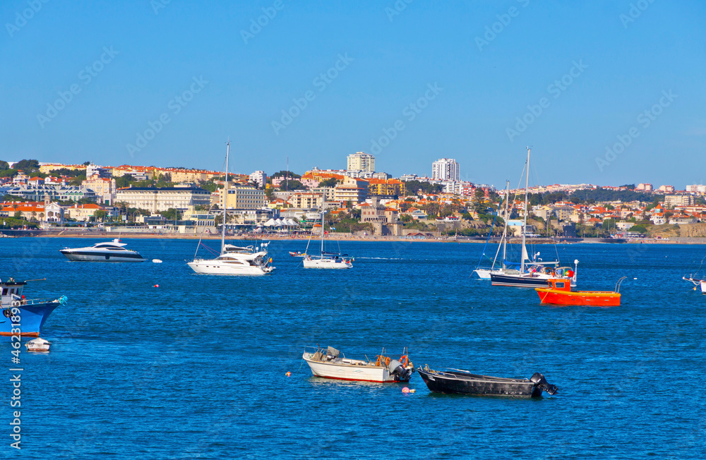 Fishing boats in the Bay of Cascais, Lisbon, Portugal. Cascais is a municipality in the Lisbon District. Famous tourist destination