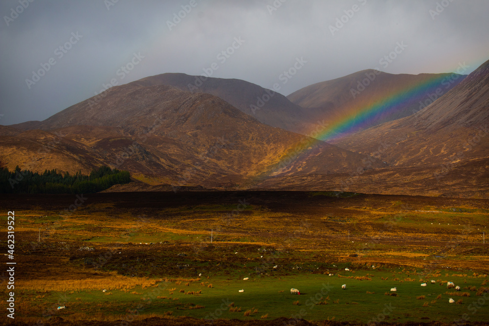 A rainbow in the hills of Isle of Skye near Broadford, Scotland, United Kingdom