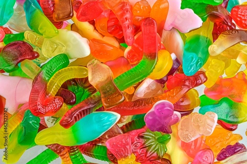 Assorted tasty gummy candies. Top view. Fruit gummy candies background