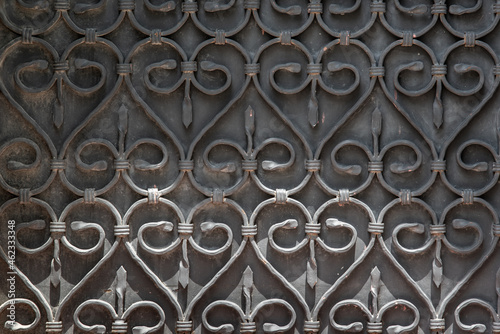 ornate wrought-iron elements of metal gate decoration. copy space.