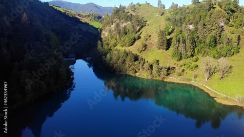 Mirror Reflection Through Pristine Lake Of Klammsee Reservoir In Kaprun Austria. Static photo