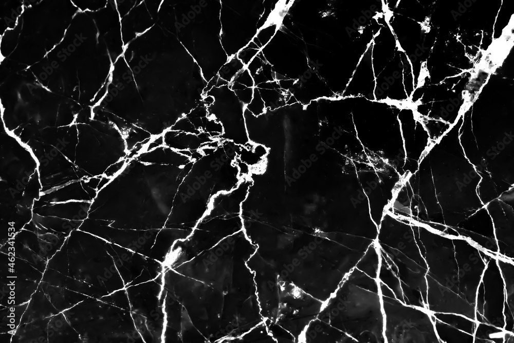 Dark black marble surface with white line curly  patterns on background