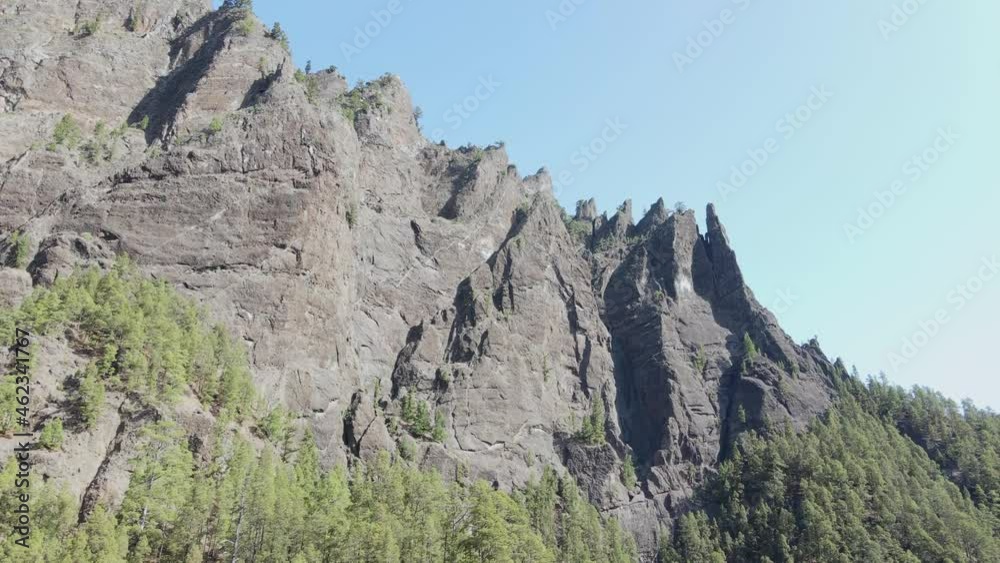 Drone video of rocky mountain cliffs in the national park Caldera de Taburiente, La Palma island, on a sunny day Drone video of rocky mountain cliffs in the national park Caldera de Taburiente, La Palma island, on a sunny day