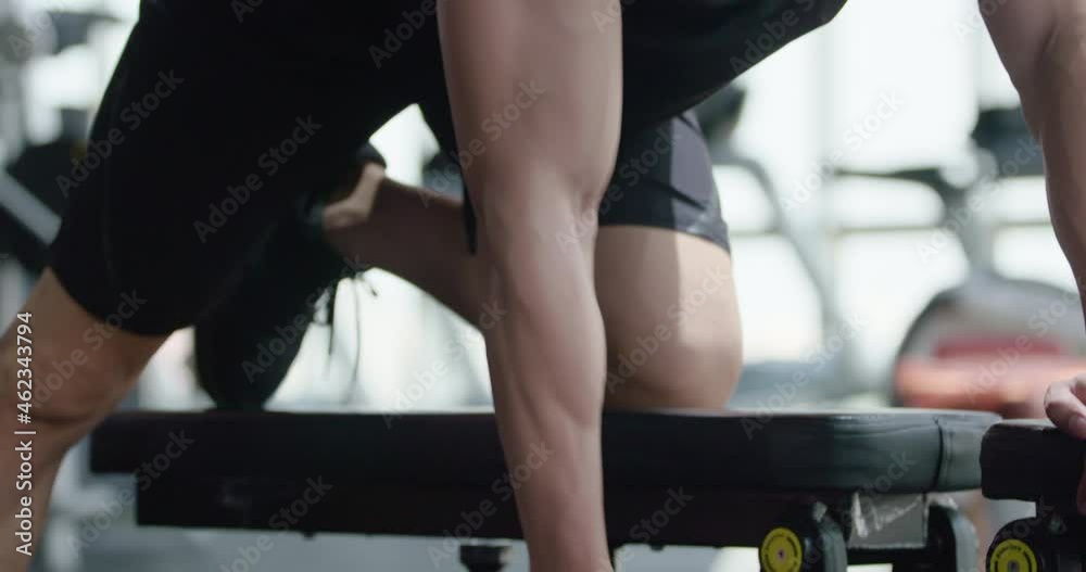 Young man working out with dumbbell at gym,4K Young man working out with dumbbell at gym,4K