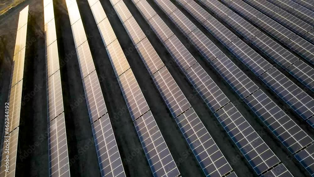 Top view of Solar cell farm power plant eco technology.landscape of Solar cell panels in a photovoltaic power plant.concept of sustainable resources.With beautiful sunshine Top view of Solar cell farm power plant eco technology.landscape of Solar cell panels in a photovoltaic power plant.concept of sustainable resources.With beautiful sunshine