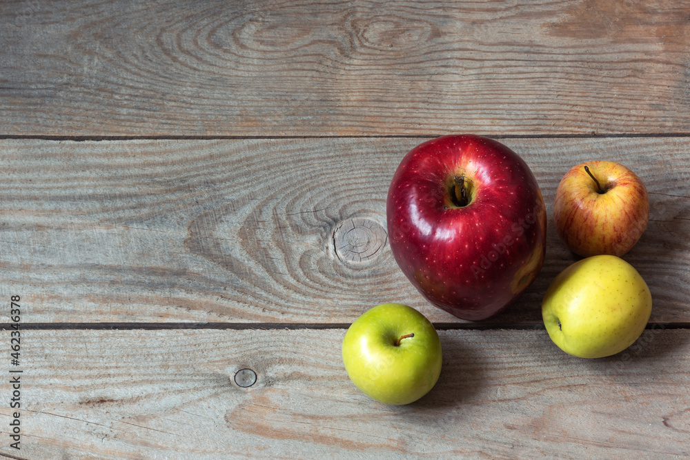Big red apple on wooden table Big red apple on wooden table