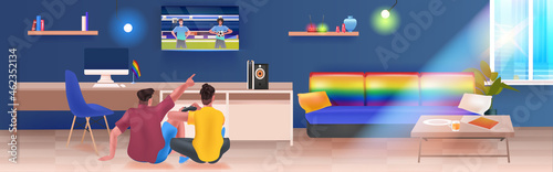 two men playing video games lgbt rainbow flag gay lesbian love parade pride festival transgender love concept
