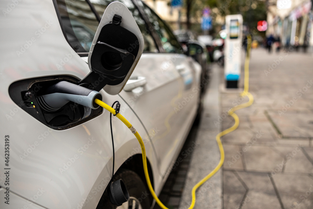 Electric car in charging station Electric car in charging station