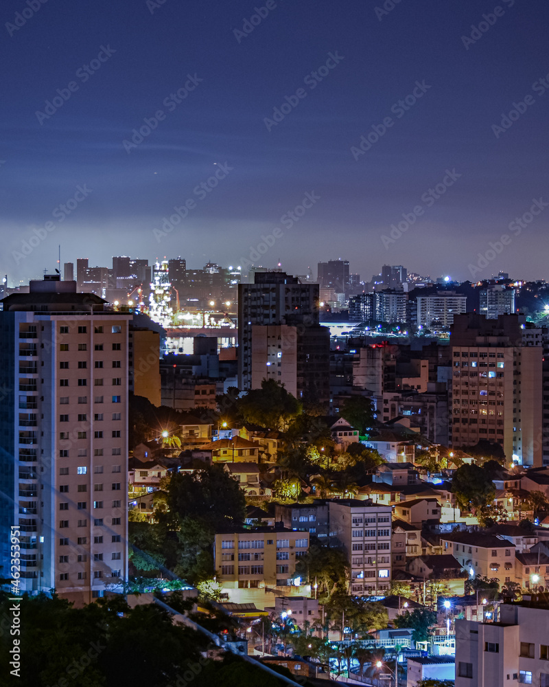 Naklejka premium Niterói, Rio de Janeiro, Brazil - CIRCA 2021: Long exposure urban night photography with buildings and lights of a Brazilian city
