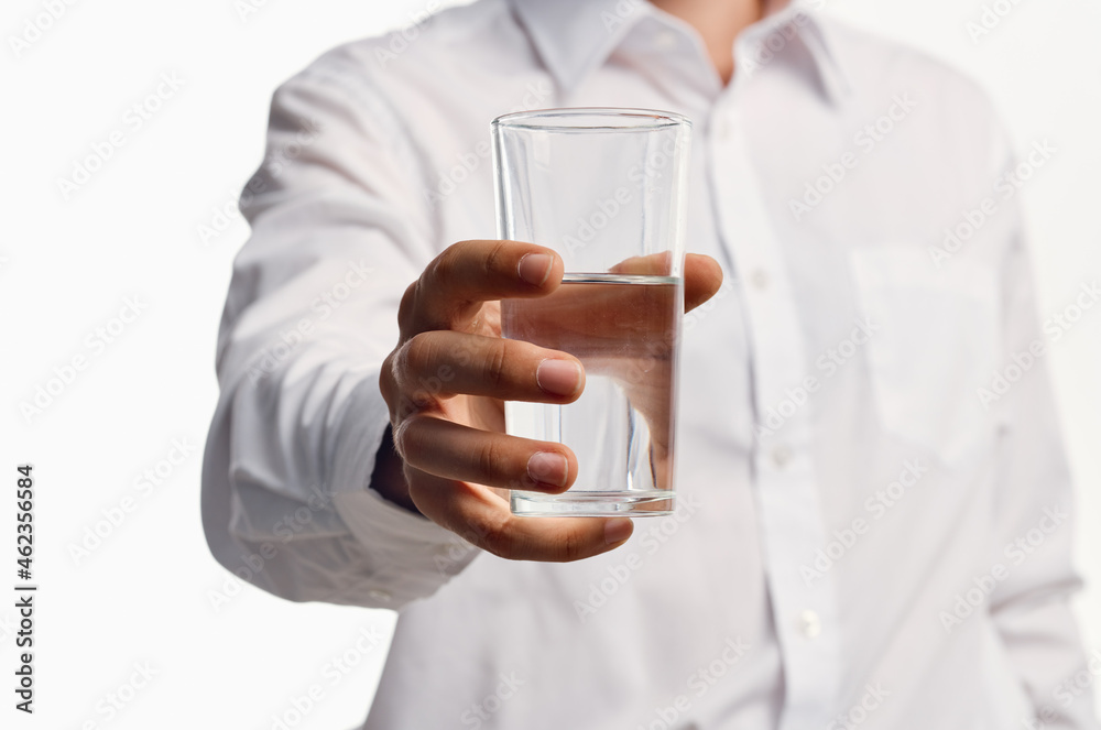 bearded man drinking water light background bearded man drinking water light background