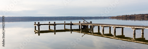 Panorama of Ammersee. Beautiful lake with wooden pier. Popular sightseeing destination. © Chris Redan