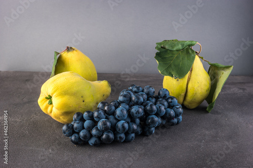 Home grown organic quinces and grapes photo