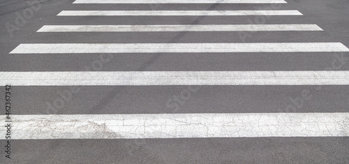 White stripes on the asphalt as a background.