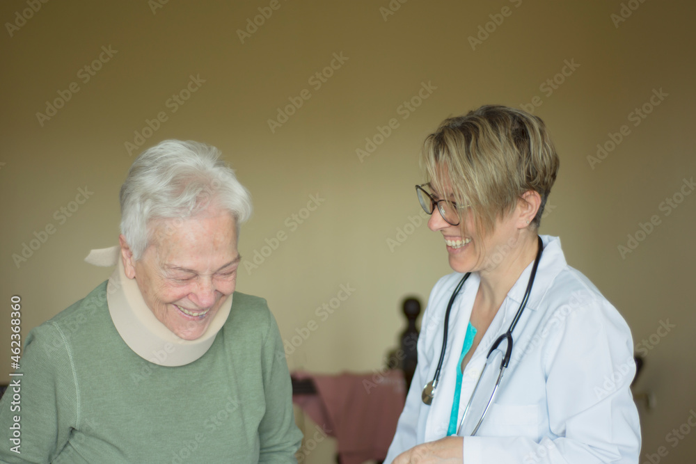 young orthopedist examining her patient. a very happy day for both young orthopedist examining her patient. a very happy day for both