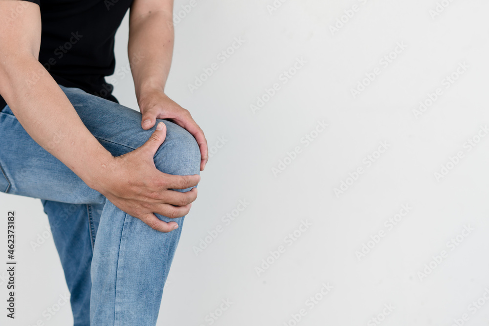 Knee pain Men suffering from knee pain from sweating or overexertion , Medical and healthcare